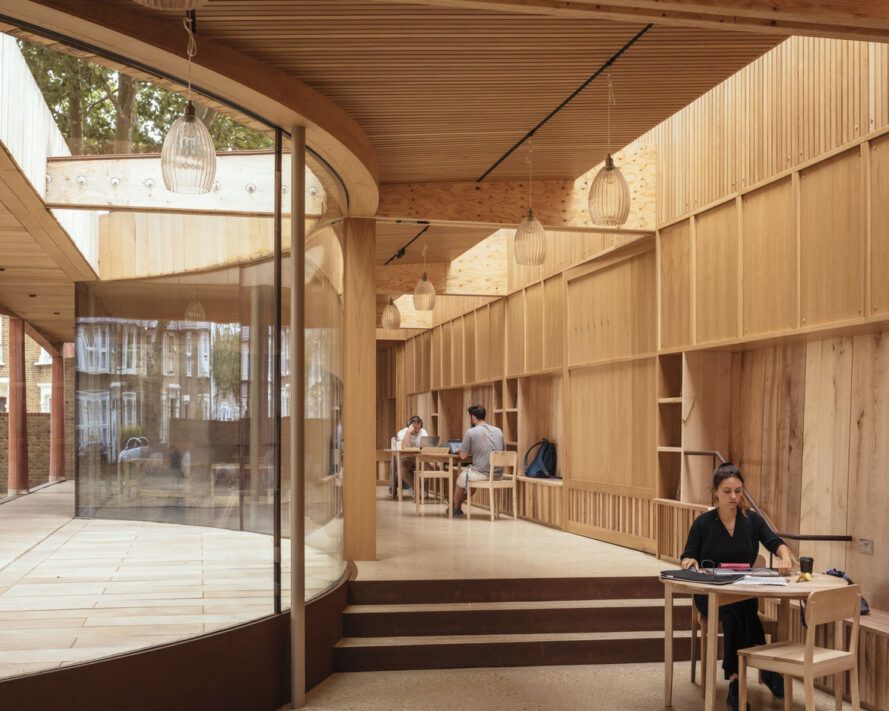 A curved glass window allowing natural light in