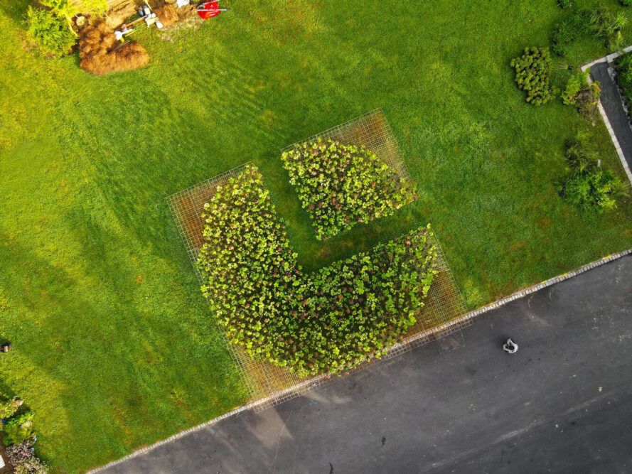 Aerial view of the installation with green grass surrounding