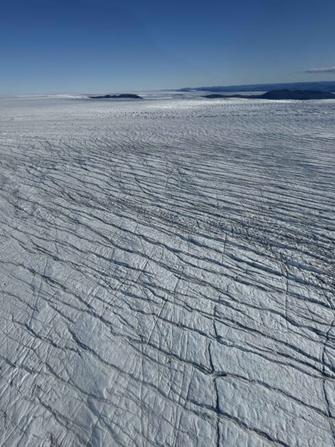 Aerial view of crevasses nearby the edge of the ice sheet